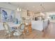 Kitchen dining area with round table and modern chairs at 173 Fiddleback Dr, Summerville, SC 29486