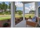 Inviting front porch with comfortable seating and view of neighborhood at 173 Fiddleback Dr, Summerville, SC 29486