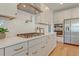 Modern kitchen with gas cooktop and white cabinets at 173 Fiddleback Dr, Summerville, SC 29486