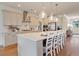 Modern kitchen with island, stainless steel appliances, and breakfast bar at 173 Fiddleback Dr, Summerville, SC 29486