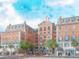 Elegant brick building with arched entryway and balconies at 609 King St # 607, Charleston, SC 29403