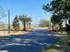 Street view of community with landscaping and water view at 1075 Capersview Ct, Awendaw, SC 29429