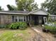 Brick ranch house with screened porch, needs landscaping at 1908 Savage Rd, Charleston, SC 29407