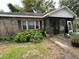 Brick ranch house with screened porch, needs landscaping at 1908 Savage Rd, Charleston, SC 29407