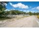 Property boasts a spacious yard, a house, and horse stables at 175 Maria Stuart Ln, Varnville, SC 29944