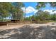 Paddocks and stables with wooden fencing at 175 Maria Stuart Ln, Varnville, SC 29944
