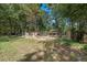 Various animal enclosures with wooden fencing at 175 Maria Stuart Ln, Varnville, SC 29944
