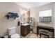 Bathroom features a vanity, toilet, and shower at 175 Maria Stuart Ln, Varnville, SC 29944