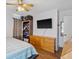 Bedroom with dresser, TV, and ample closet space at 175 Maria Stuart Ln, Varnville, SC 29944