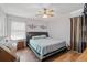 Spacious bedroom with a king-size bed and wood floors at 175 Maria Stuart Ln, Varnville, SC 29944