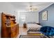 Bedroom with a full bed, armchair, and wood floors at 175 Maria Stuart Ln, Varnville, SC 29944