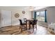 Charming dining area with a round table and four chairs at 175 Maria Stuart Ln, Varnville, SC 29944