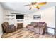 Open living room featuring a fireplace and comfy seating at 175 Maria Stuart Ln, Varnville, SC 29944