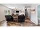 Relaxing living room with a fireplace and comfortable leather recliners at 175 Maria Stuart Ln, Varnville, SC 29944
