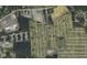 Aerial view of property near residential area with pond and businesses at 1501 Central Ave, Summerville, SC 29483