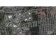 Aerial view showing a large lot near residential homes and businesses at 1501 Central Ave, Summerville, SC 29483