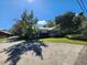 Charming one-story home with a metal roof and a spacious yard at 1501 Central Ave, Summerville, SC 29483