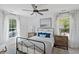 Bright bedroom with metal bed frame, two nightstands, and plenty of natural light at 507 Fiskdale Cir, Summerville, SC 29486