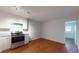 Eat-in kitchen featuring stainless steel appliances and wood flooring at 40 Bee St # 111, Charleston, SC 29403