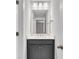 Elegant bathroom features a gray vanity with white countertop and stylish lighting at 1153 Oak Bluff Ave, Charleston, SC 29492