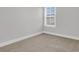 Neutral bedroom with plush carpeting, white trim, and window with blinds at 1153 Oak Bluff Ave, Charleston, SC 29492