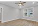 Comfortable bedroom featuring a ceiling fan and a window that offers plenty of natural light at 1153 Oak Bluff Ave, Charleston, SC 29492
