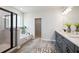 Bright bathroom featuring a walk-in shower, soaker tub, double vanity with modern fixtures, and neutral tones at 3000 Winding Grove Ln, Moncks Corner, SC 29461