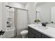 Neutrally designed bathroom features a tub-shower combination, toilet, and a large vanity with black fixtures at 3000 Winding Grove Ln, Moncks Corner, SC 29461