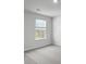 Bright bedroom with neutral paint, carpet, and a window that provides natural light at 220 Maple Hill Dr, Moncks Corner, SC 29461
