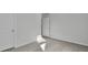 Bedroom featuring neutral paint, carpet, and an ensuite bathroom for added convenience at 220 Maple Hill Dr, Moncks Corner, SC 29461