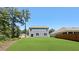 Expansive backyard with lush lawn, perfect for outdoor activities and relaxation with home in background at 127 Morning View Way, Moncks Corner, SC 29461