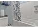 Clean bathroom with tub shower and updated vanity at 8375 Shell House Rd, Edisto Island, SC 29438