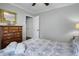 Spacious bedroom with a full-size bed and dresser at 8375 Shell House Rd, Edisto Island, SC 29438