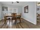 Charming dining room with wood table and four chairs at 8375 Shell House Rd, Edisto Island, SC 29438