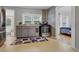 Updated kitchen with gray cabinets, stainless steel appliances, and a view into a bedroom at 8375 Shell House Rd, Edisto Island, SC 29438