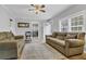 Living room with two sofas and view of kitchen at 8375 Shell House Rd, Edisto Island, SC 29438
