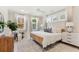 Spacious main bedroom with large bed and plenty of natural light at 1157 Oak Bluff Ave, Charleston, SC 29492