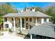 Luxury home with extensive stone patio, pool, and landscaped grounds at 633 Barbados Dr, Charleston, SC 29492