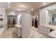Elegant bathroom with double vanity, soaking tub, and walk-in shower at 633 Barbados Dr, Charleston, SC 29492