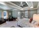 Serene bedroom featuring a tranquil color palette and coffered ceiling at 633 Barbados Dr, Charleston, SC 29492