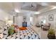 Spacious main bedroom with high ceilings, sitting area, and decorative bedding at 633 Barbados Dr, Charleston, SC 29492
