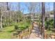 Wooden boardwalk leads to a beautiful waterfront home at 633 Barbados Dr, Charleston, SC 29492