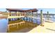 Waterfront property with a large, covered boat dock and access to the water at 633 Barbados Dr, Charleston, SC 29492