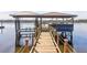 Covered boat dock with multiple slips and a spacious sitting area at 633 Barbados Dr, Charleston, SC 29492