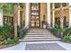 Elegant entryway with double doors and stone steps at 633 Barbados Dr, Charleston, SC 29492