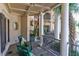 Relaxing front porch with rocking chairs, offering a view of the home's entrance at 633 Barbados Dr, Charleston, SC 29492