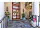 Welcoming front porch with double doors and stone flooring at 633 Barbados Dr, Charleston, SC 29492