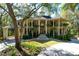 Large home with circular driveway and lush landscaping at 633 Barbados Dr, Charleston, SC 29492