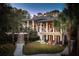 Grand two-story home with pool and manicured lawn at 633 Barbados Dr, Charleston, SC 29492