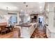 Open concept kitchen with island, breakfast nook, and hardwood floors at 633 Barbados Dr, Charleston, SC 29492
